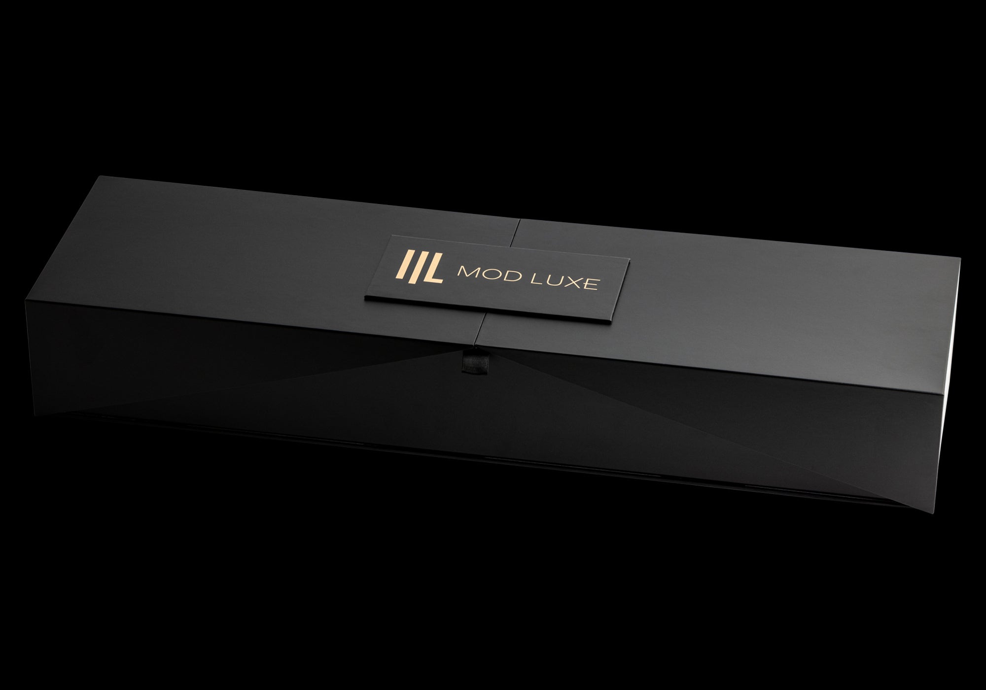 The SPLENDOUR Champagne Sabre by MOD LUXE is presented in an elegant black gift box, designed to showcase the brand's commitment to quality and luxury.
