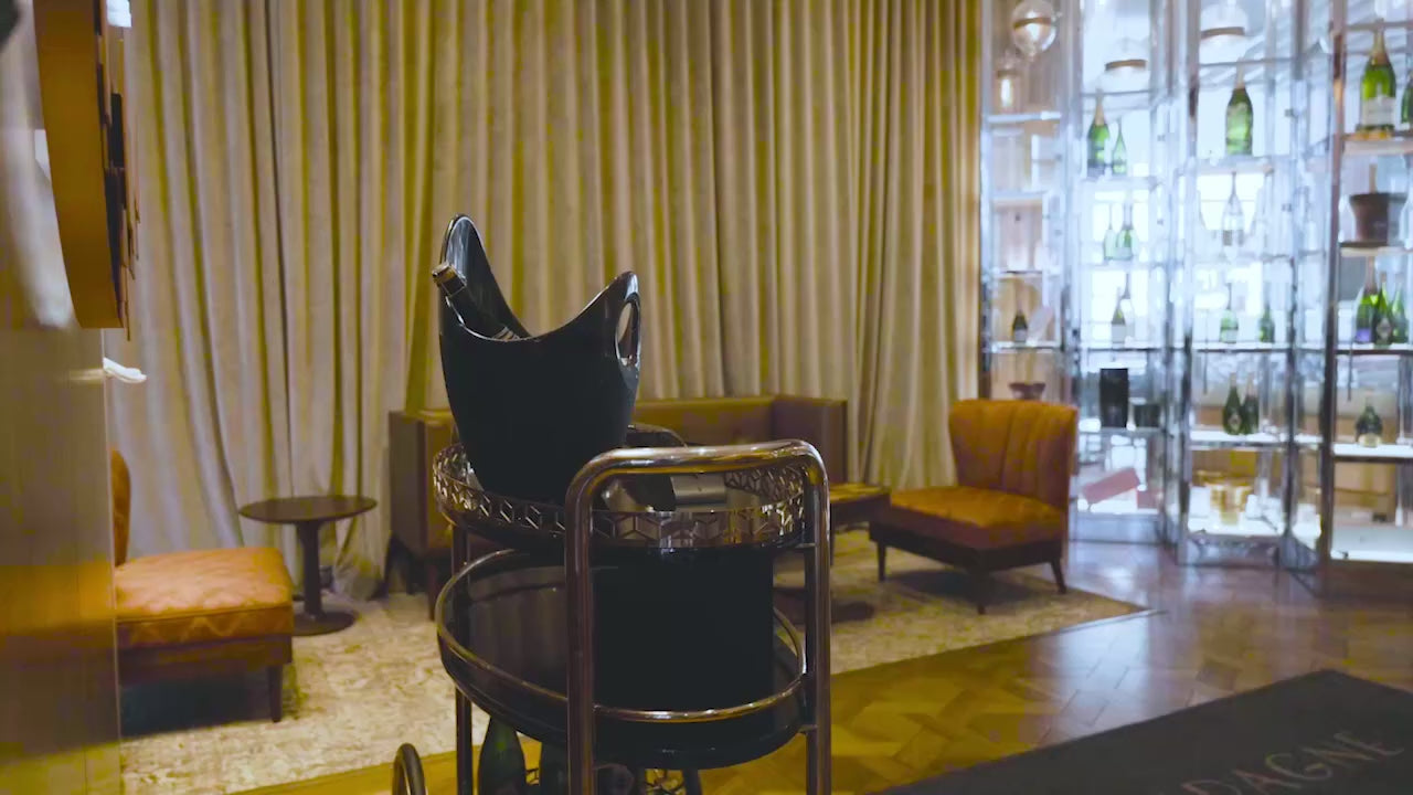 Video of a sommelier at Champagne Bar Sydney demonstrating the step-by-step champagne sabrage performance with the SPLENDOUR Champagne Sabre by MOD LUXE.