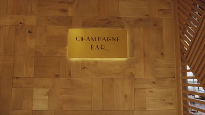 Video of a sommelier at Champagne Bar Sydney demonstrating the step-by-step champagne sabrage performance with the SPLENDOUR Champagne Sabre by MOD LUXE.